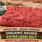 A block of 100% grass-fed beef from winterscattleranch’s Labor Day Box Bundle rests on parchment paper, surrounded by labels that read Grass Fed, Grain Finished, Organic Raised, Extra Lean 93/7, No Antibiotics or Hormones, Extra Lean Hamburger Patties, and Monthly Subscription above and below the beef.
