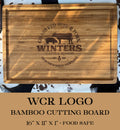 Show your ranch pride with the Winters Cattle Ranch Bamboo Cutting Board, 16 x 11 x 1. Engraved logo with cow and pig silhouettes. Food safe—perfect for celebrating your local rancher!.