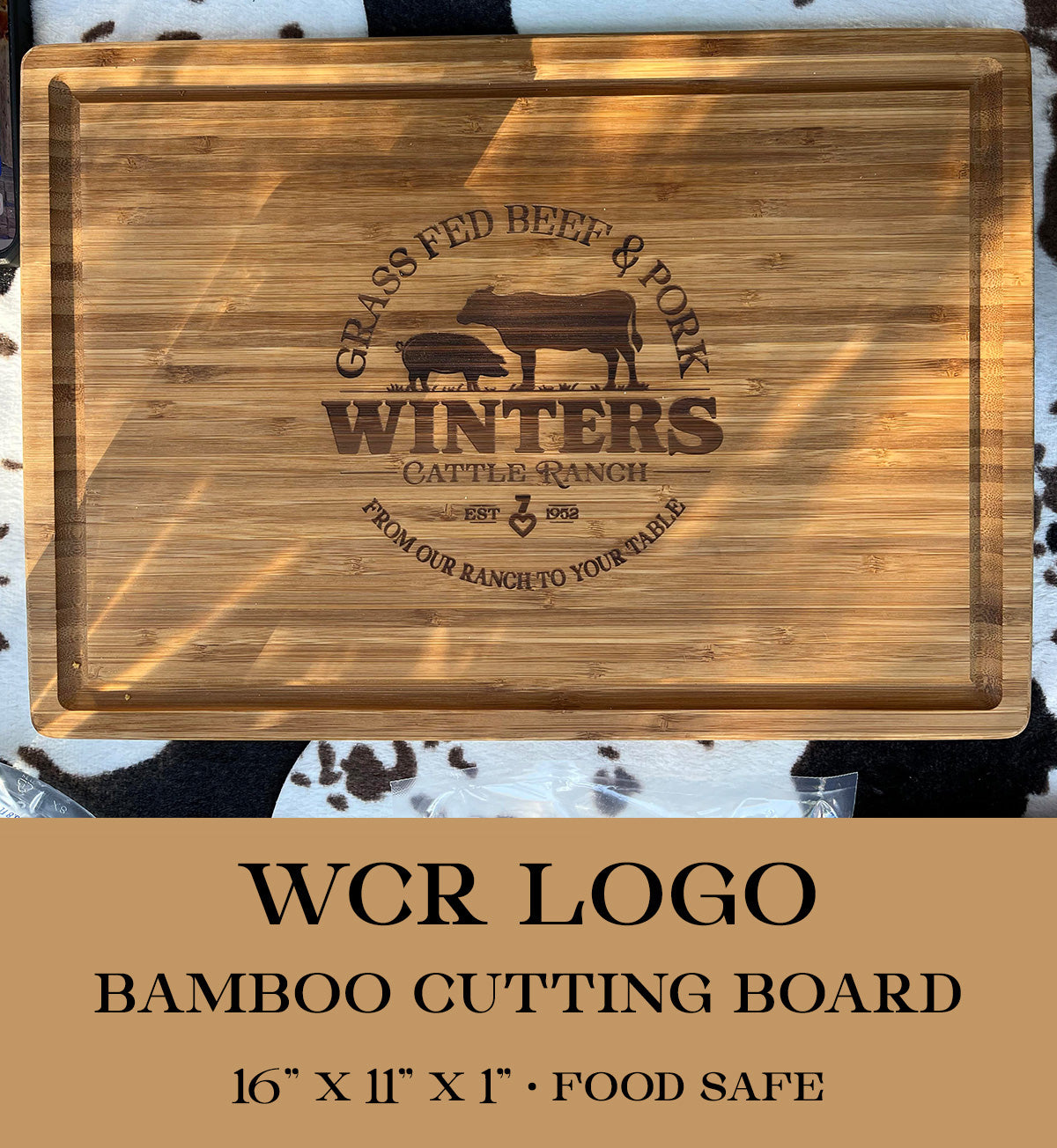 Show your ranch pride with the Winters Cattle Ranch Bamboo Cutting Board, 16 x 11 x 1. Engraved logo with cow and pig silhouettes. Food safe—perfect for celebrating your local rancher!.