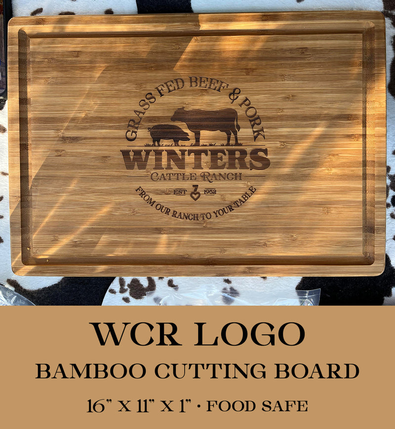 Show your ranch pride with the Winters Cattle Ranch Bamboo Cutting Board, 16 x 11 x 1. Engraved logo with cow and pig silhouettes. Food safe—perfect for celebrating your local rancher!.