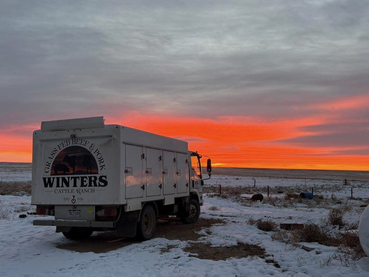 Winters Ranch delivery truck on the Front Range at sunset